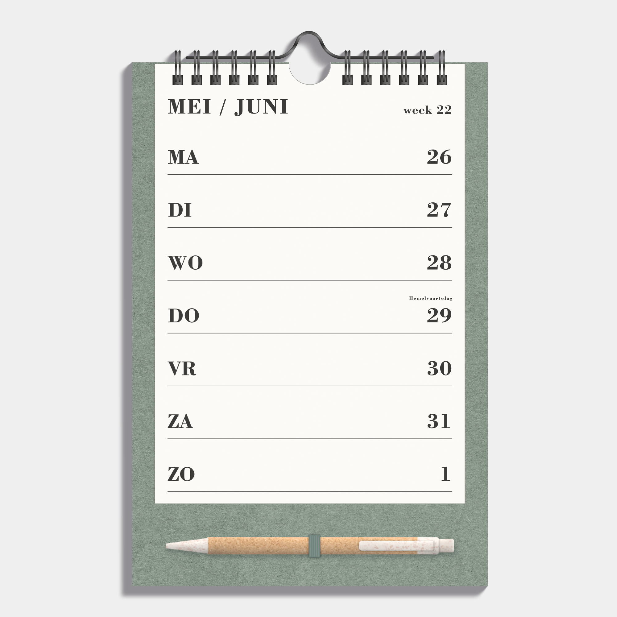 Weekkalender schooljaar 2025 - 2026 A5 met crèmekleurig papier op groen bord met metalen spiraal en pen – binnenwerk met weekoverzicht.