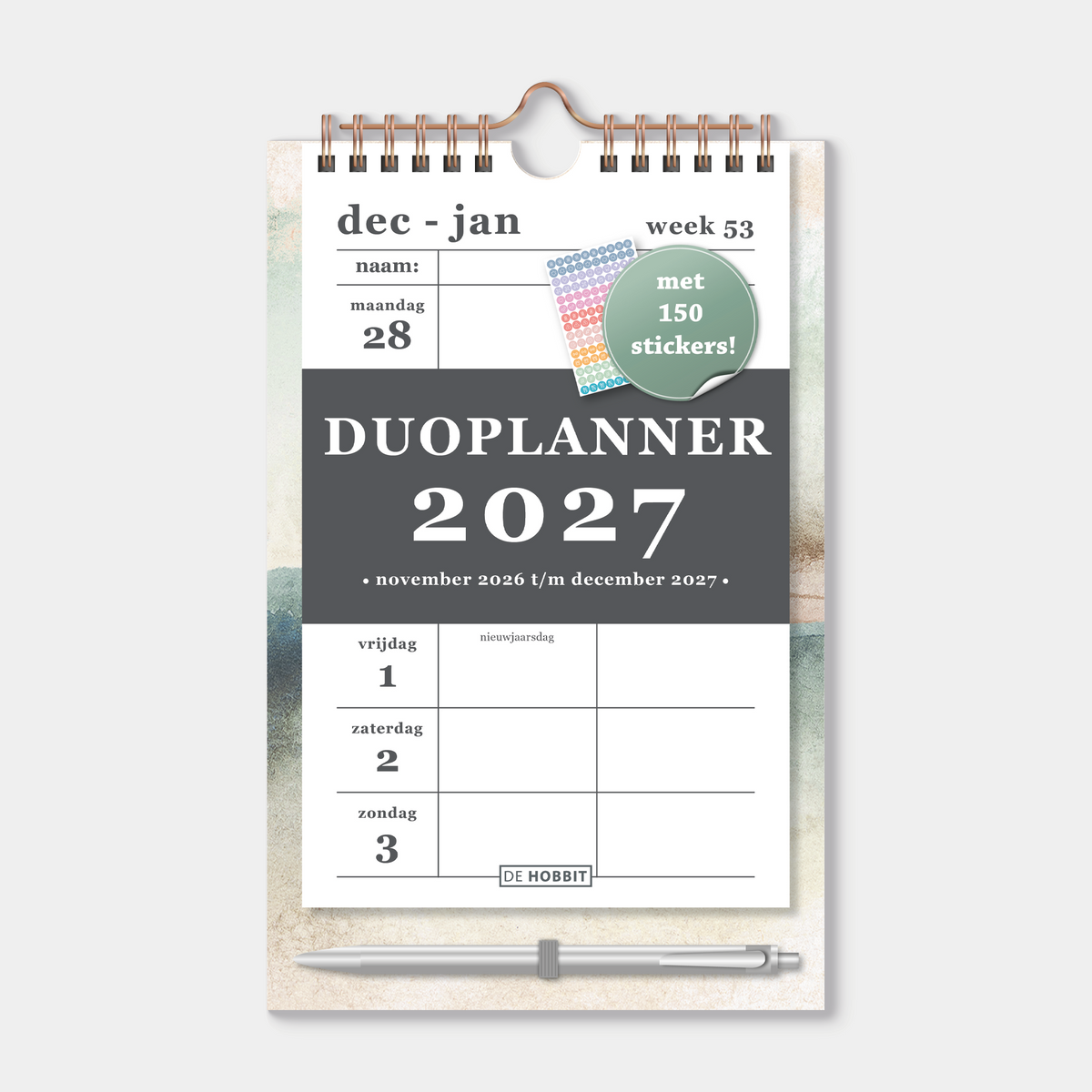 Duoplanner 2027 A5 op een kartonnen bord met een dessin van aquarel aardetinten, met pen – vooraanzicht.