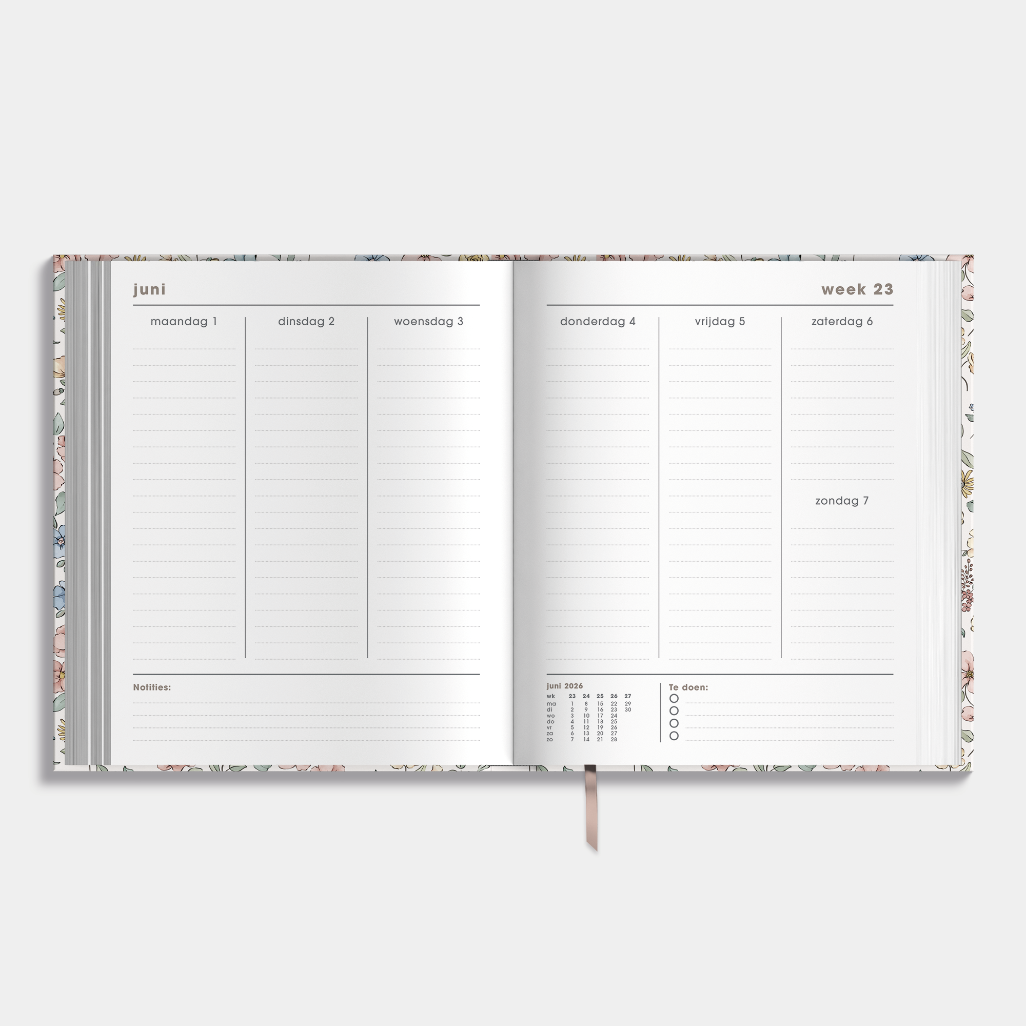Luxe weekplanner 2026-2027 in A5+ formaat met een dessin van kleine bloemetjes in pasteltinten – weekoverzicht.