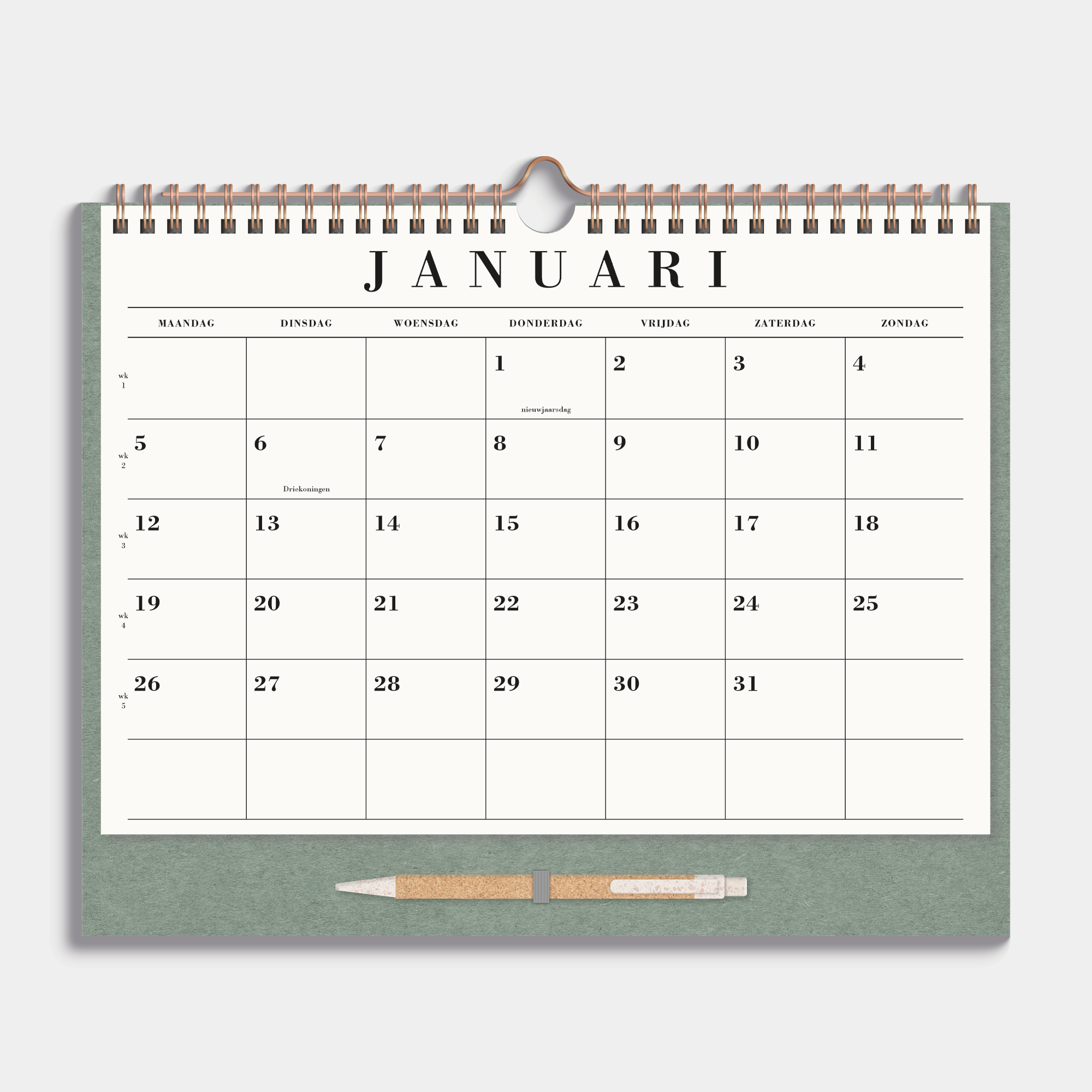 maandkalender 2026 A4 op een kartonnen bord met pen en metalen spiraal – maandoverzicht.