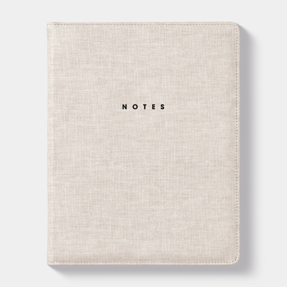 Notitieboek in het A5+ formaat met een flexibele linnen coverhoes – vooraanzicht.