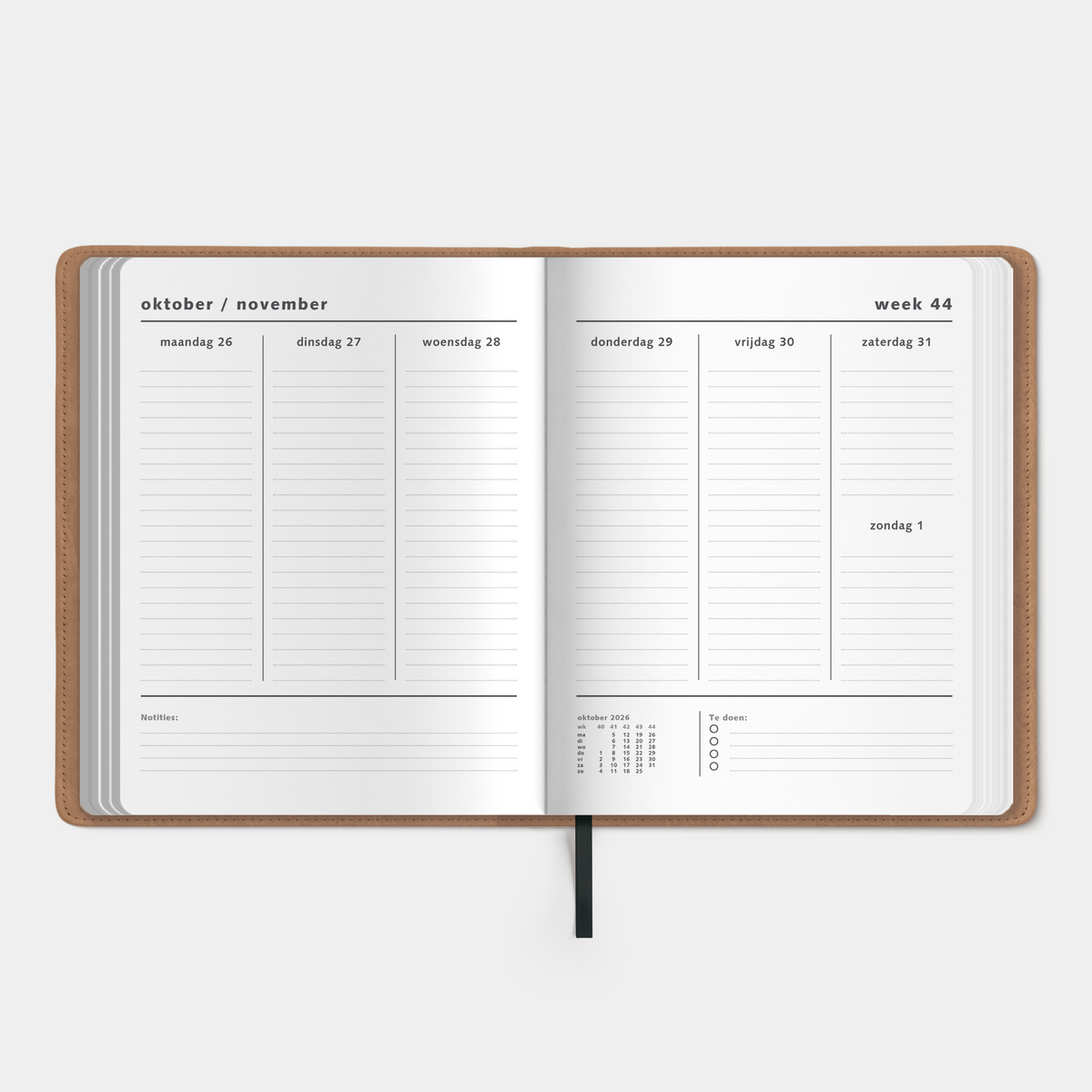 weekplanner 2027 met flexibele bruine washed craft coverhoes – binnenwerk met weekoverzicht en ruimte voor notities.
