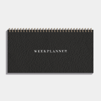 Bureauplanner undated met zwarte lederlook cover en metalen ringband – vooraanzicht.