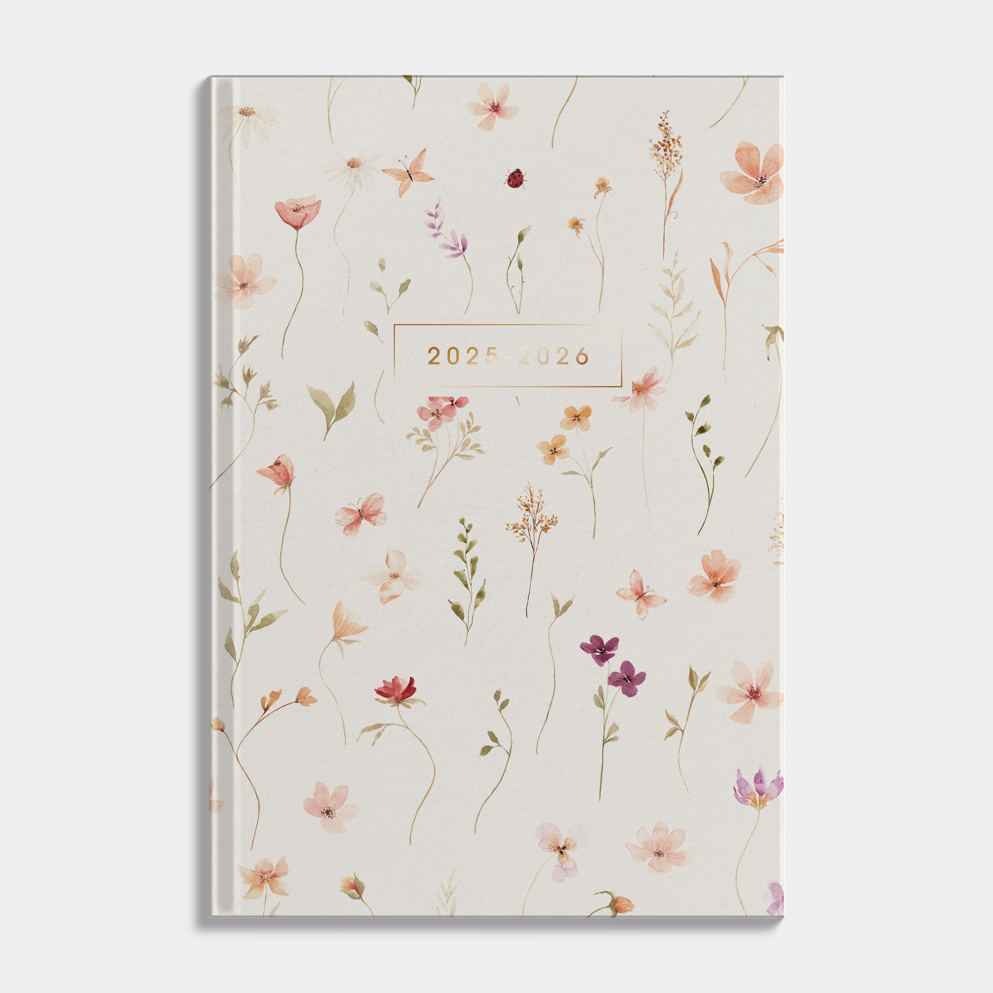 Luxe A5 schoolagenda 2025-2026 met aquarel bloemenprint en harde cover – vooraanzicht.