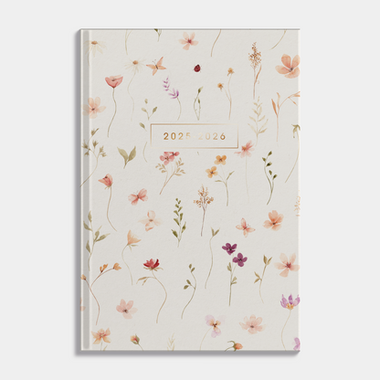 Luxe A5 schoolagenda 2025-2026 met aquarel bloemenprint en harde cover – vooraanzicht.