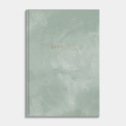 A5 schoolagenda 2025-2026 met groene, harde cover – vooraanzicht.