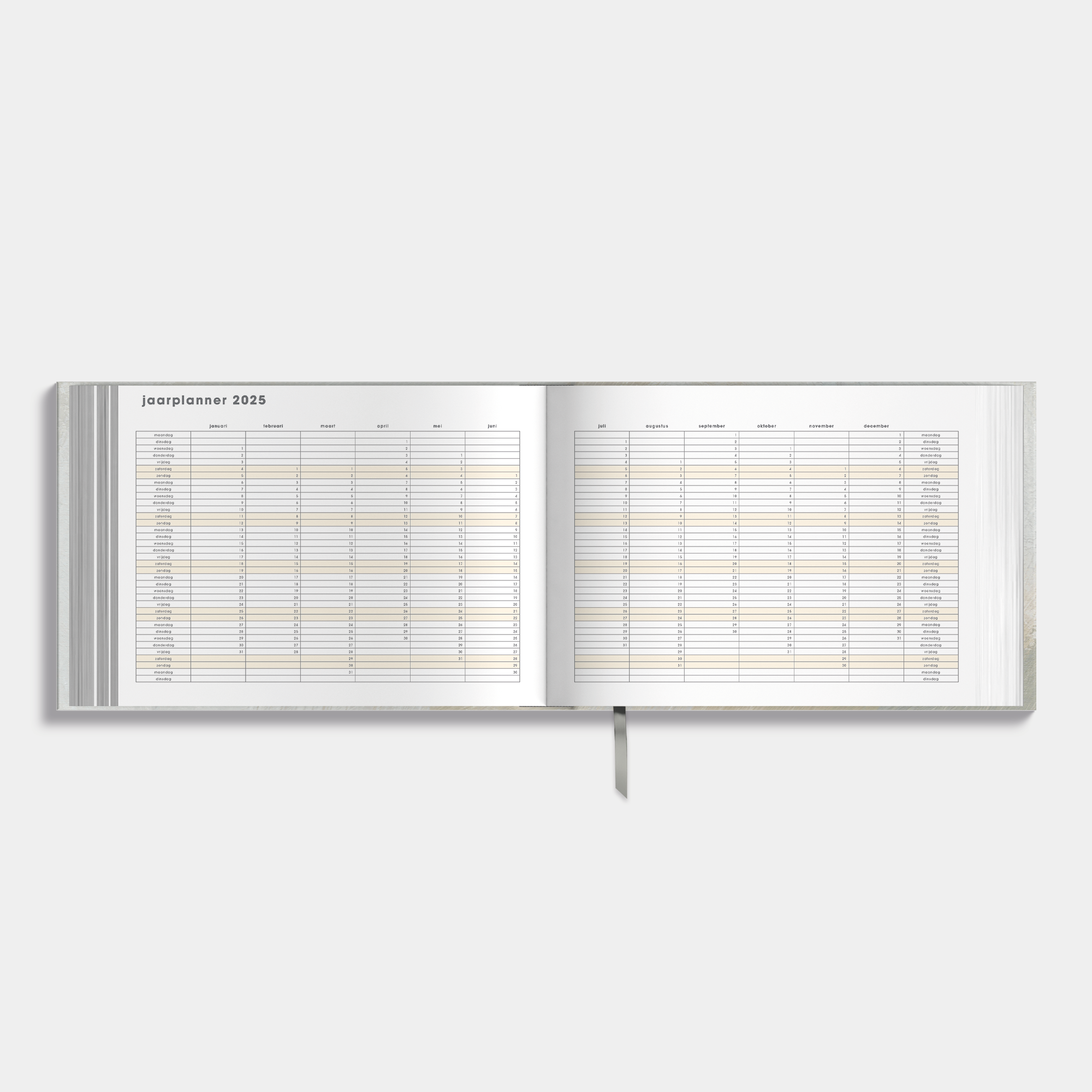 Studieplanner 2025-2026 A5 met design van grijsgroene verfstreken – binnenwerk met jaarplanner.