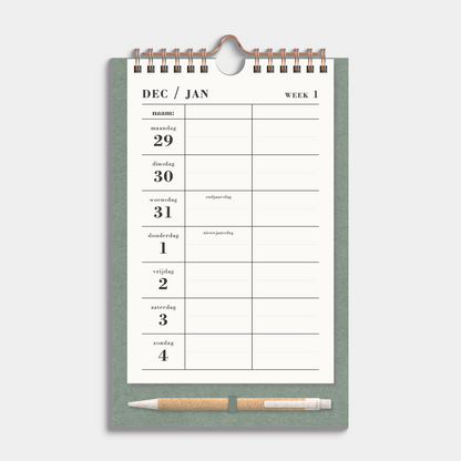 Duoplanner 2026 A5 met een groen kartonnen bord met pen – weekoverzicht.