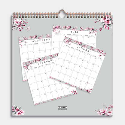 Spiraalgebonden jaarkalender 2026 met kersenbloesemprint – achteraanzicht.