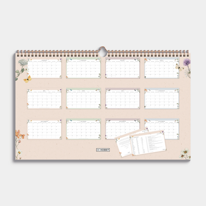 maandkalender 2026 in bijna A3 formaat met veldbloemenprint en metalen spiraal – achteraanzicht.