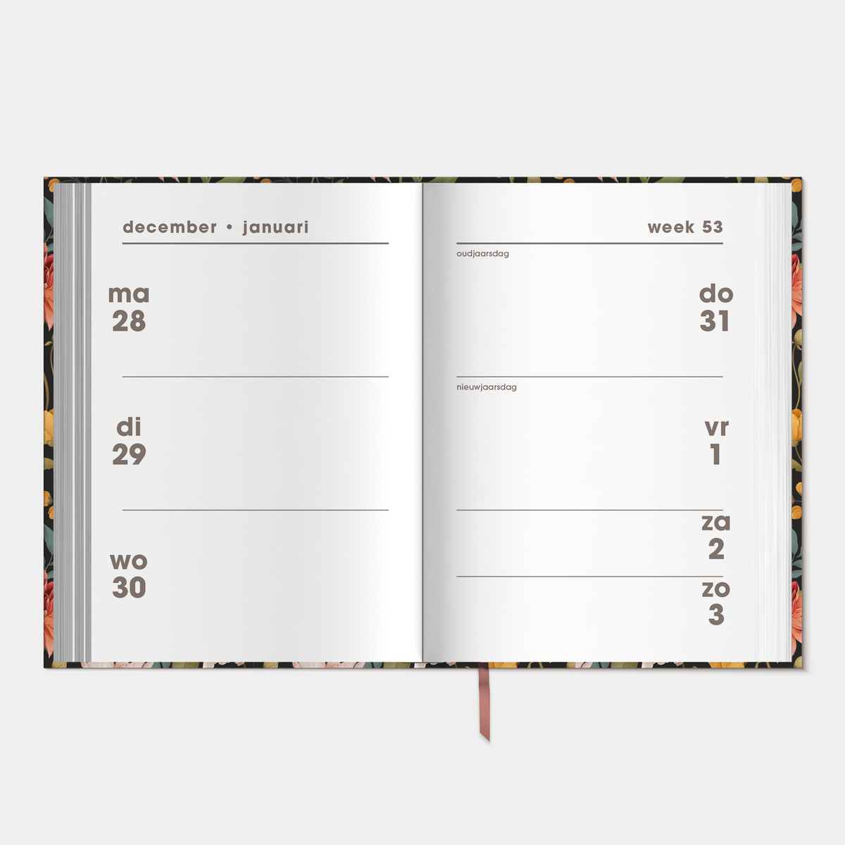 kleine agenda 2027 met vintage print van bloemen en harde cover – binnenwerk met weekoverzicht.