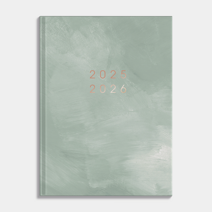 A6 agenda 2025-2026 met groene, harde cover – vooraanzicht.