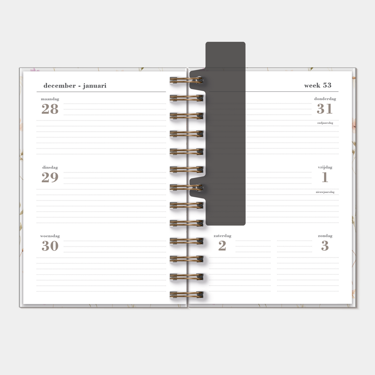 Ringband agenda 2027 in B6 formaat met print van kleine aquarel bloemetjes, harde cover en elastische sluiting – binnenwerk met weekoverzicht.