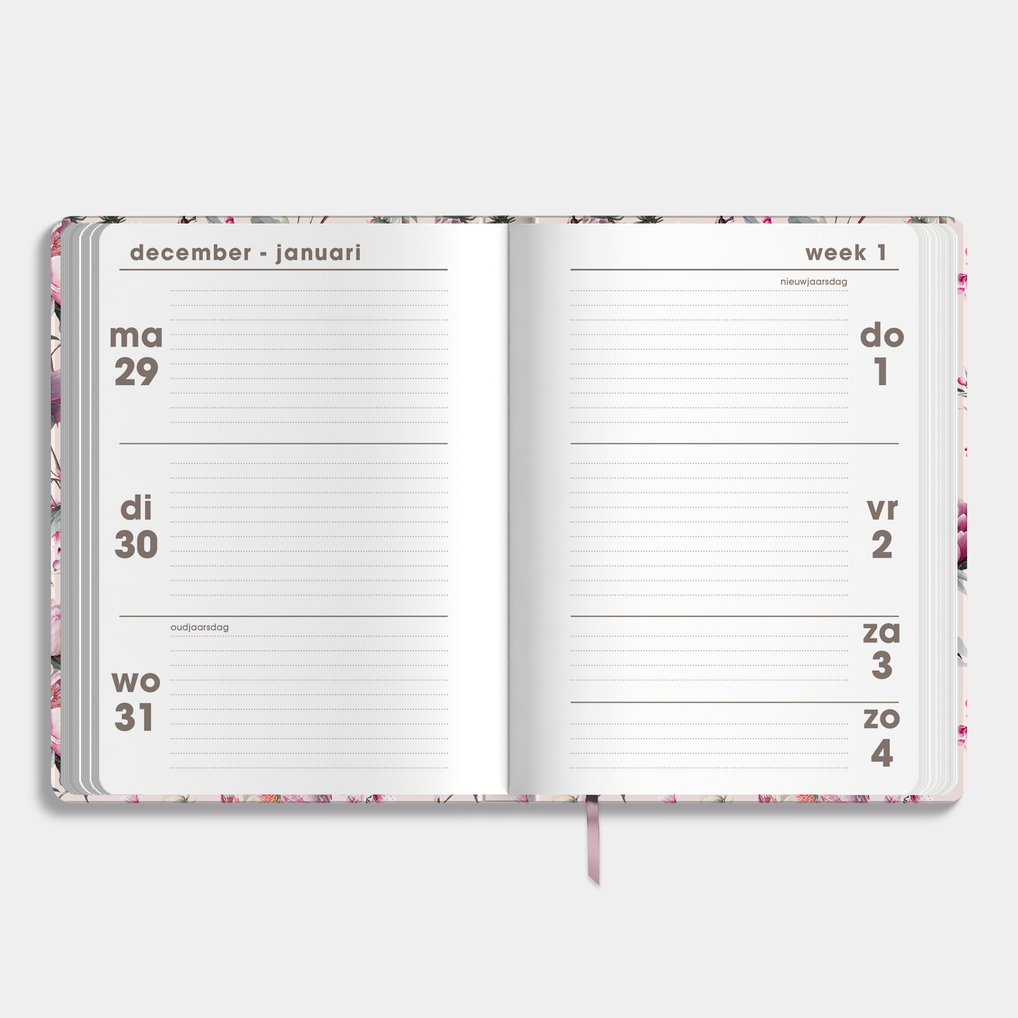 A6 agenda 2026 met kersenbloesemprint, met zachte maar stevige cover en elastische sluiting – binnenwerk met weekoverzicht.
