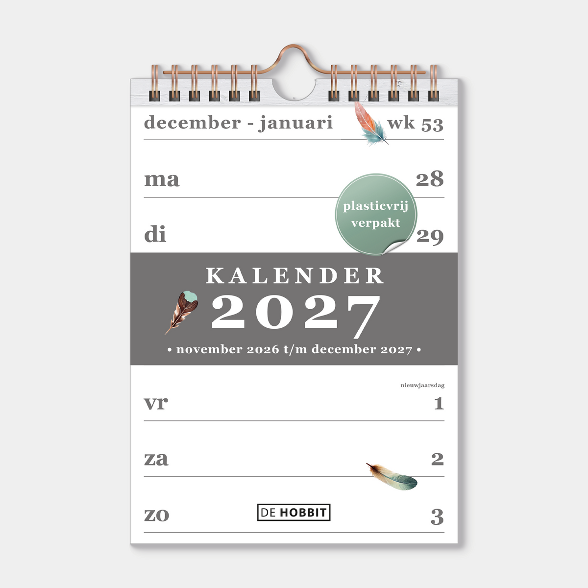 Weekkalender 2027 in A5 formaat met een motief van veertjes, gebonden in een koperkleurige metalen spiraal en hanger – vooraanzicht met voorblad.