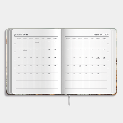 weekplanner 2026 met stijlvolle veldbloemenprint – binnenwerk met maandplanner.